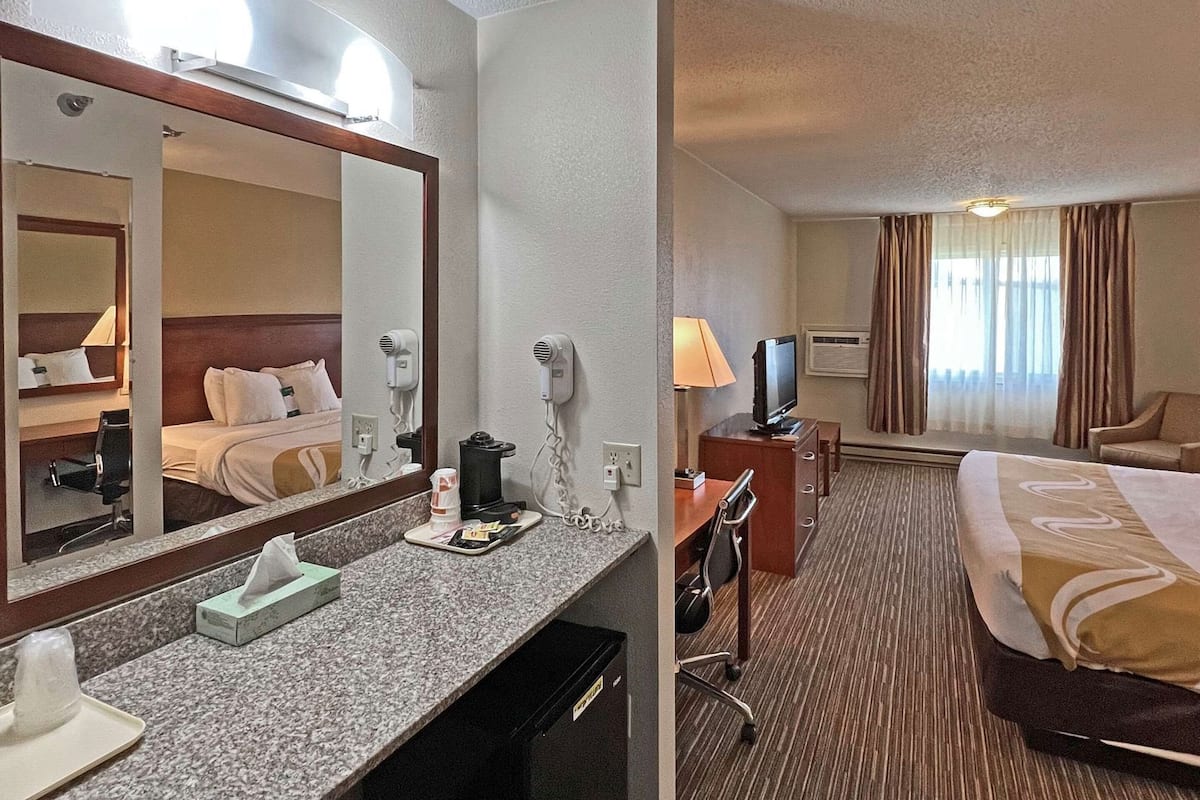 Desk, blackout drapes, iron/ironing board, free cribs/infant beds