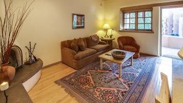 Suite, 1 Bedroom | Living area | Flat-screen TV