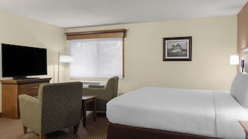 1 King bed Executive Suite w/ sitting area, wet bar, microwave, mini fridge | Laptop workspace, iron/ironing board, free WiFi, bed sheets