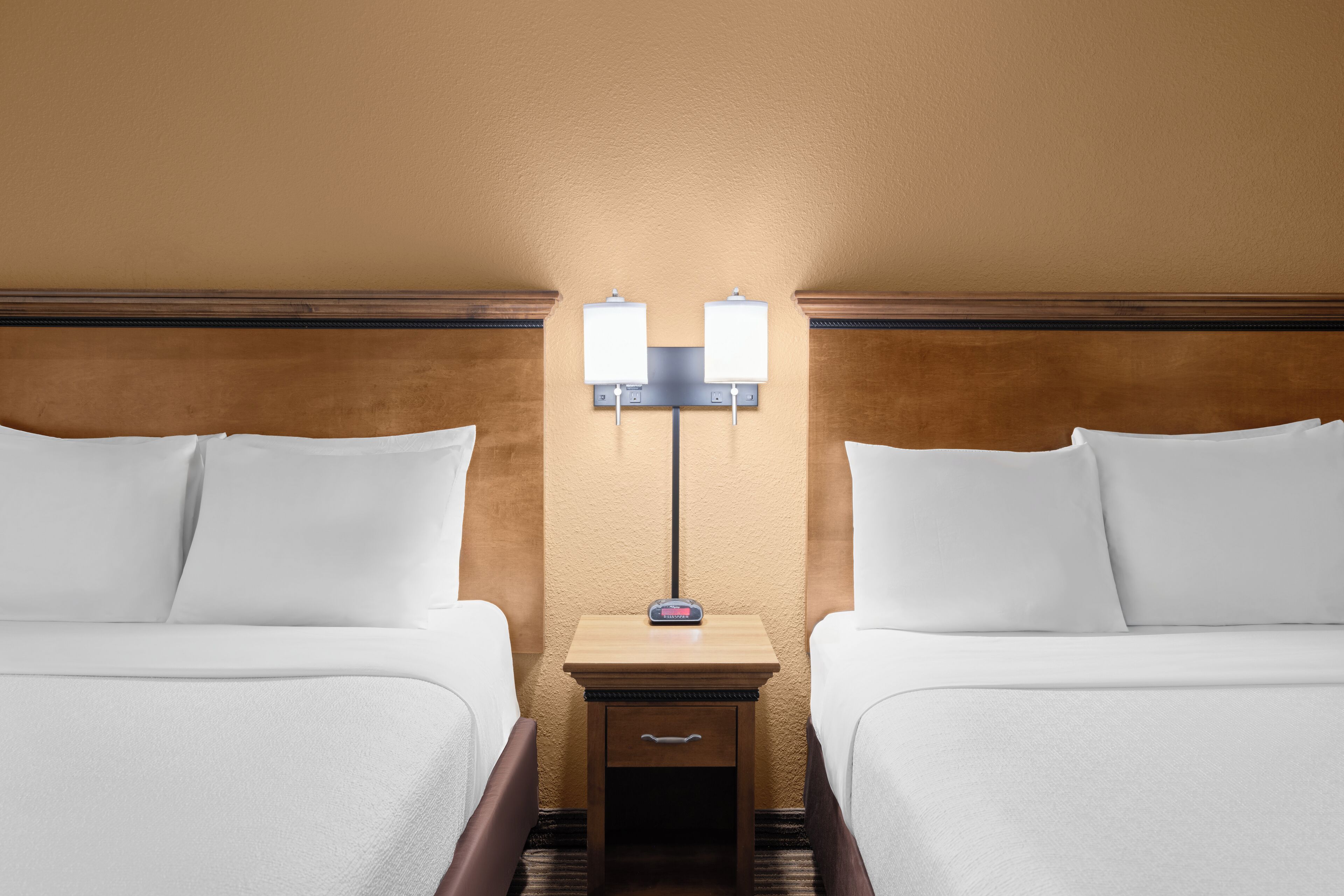 deluxe room, 2 queen beds | laptop workspace, iron/ironing board, free wifi, bed sheets