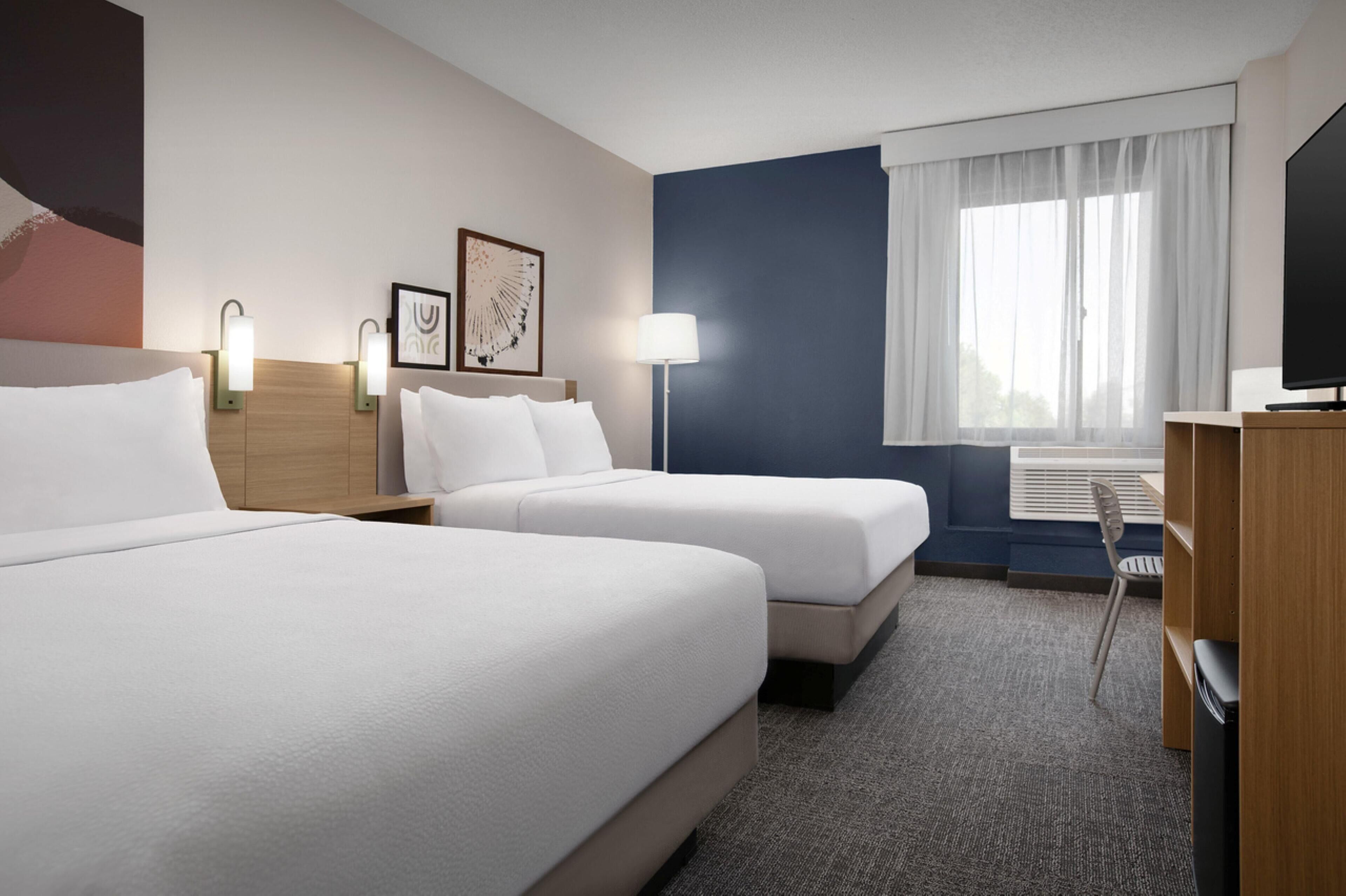 Room, 2 Queen Beds | Premium bedding, pillow-top beds, individually furnished, desk