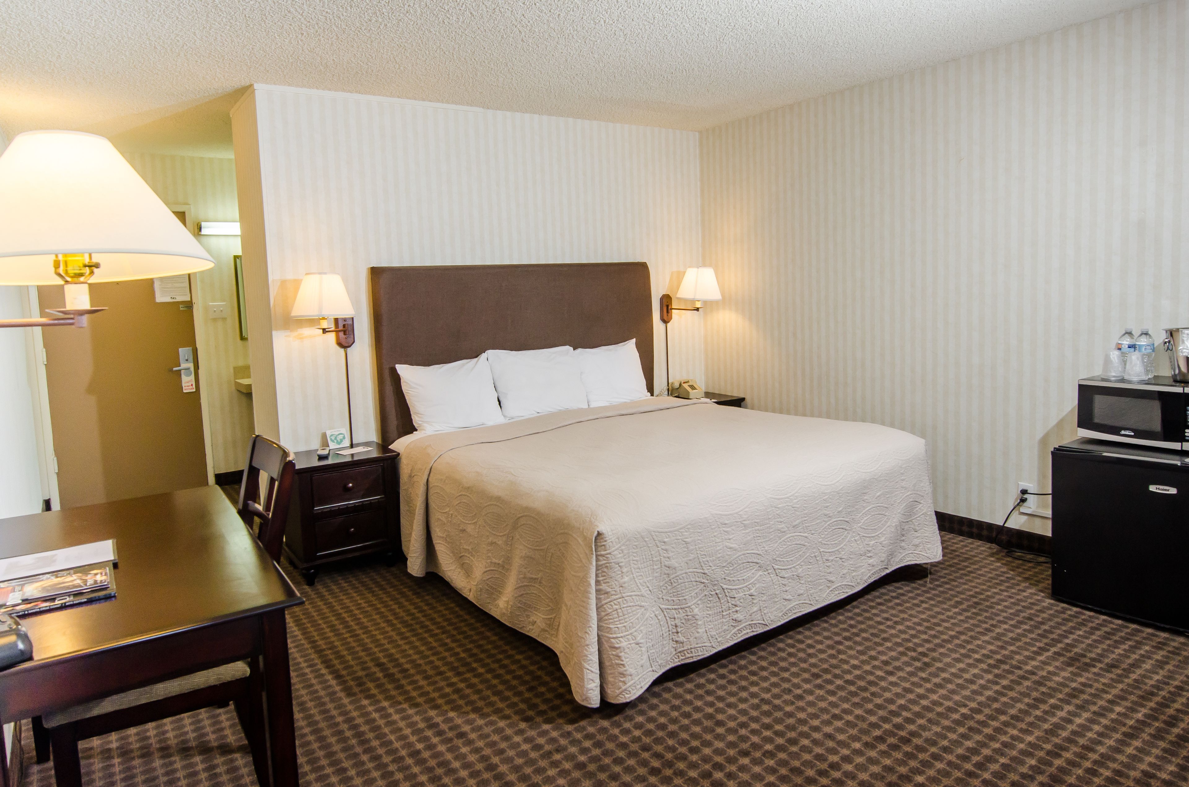 desk, blackout curtains, iron/ironing board, rollaway beds