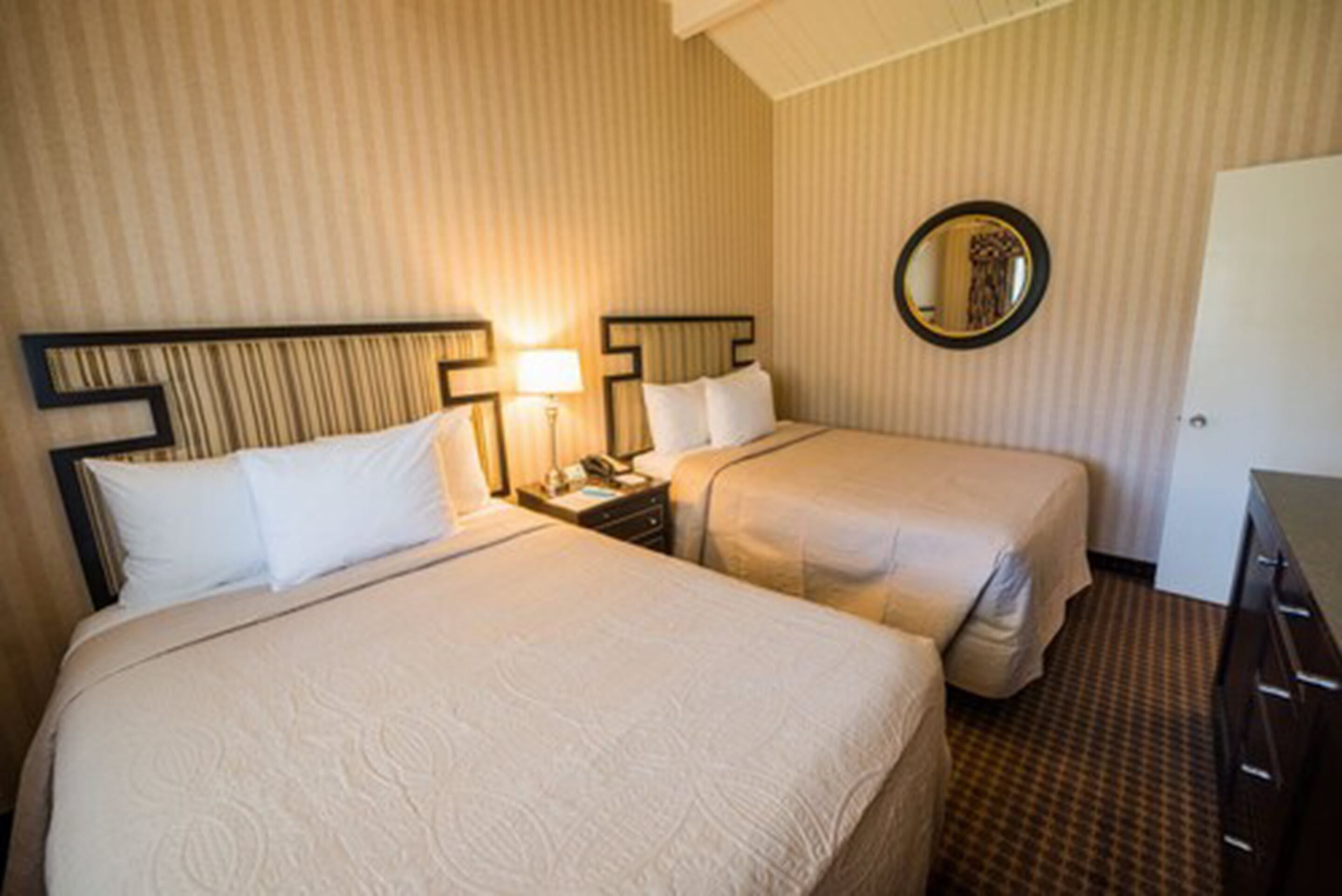suite, multiple beds | desk, blackout curtains, iron/ironing board, rollaway beds