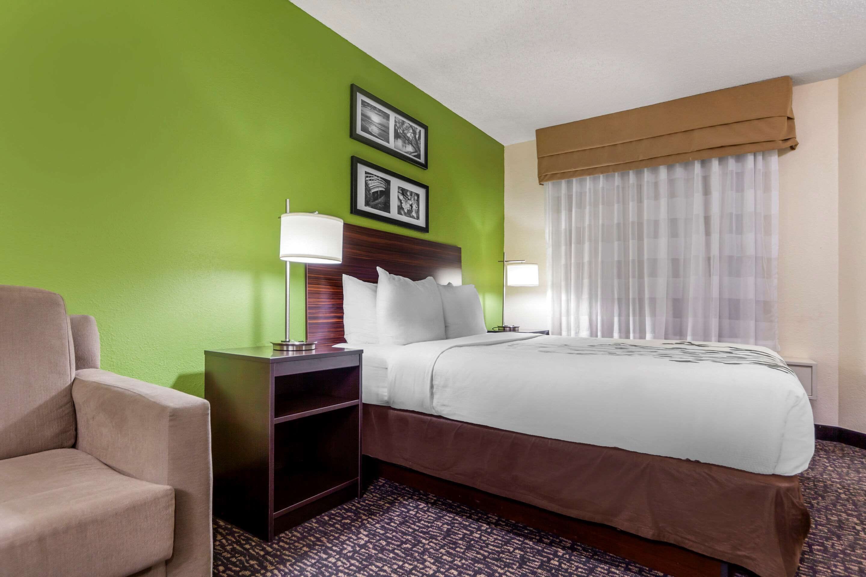 suite, 2 queen beds, non smoking | in-room safe, desk, iron/ironing board, cots/infant beds