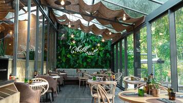 Breakfast, lunch, dinner served; French cuisine, garden views