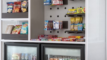 A comfort cart stocked with snacks, beverages, and other items.