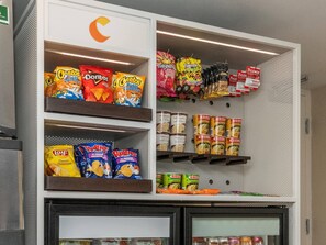 A snack display with various chips and snacks.