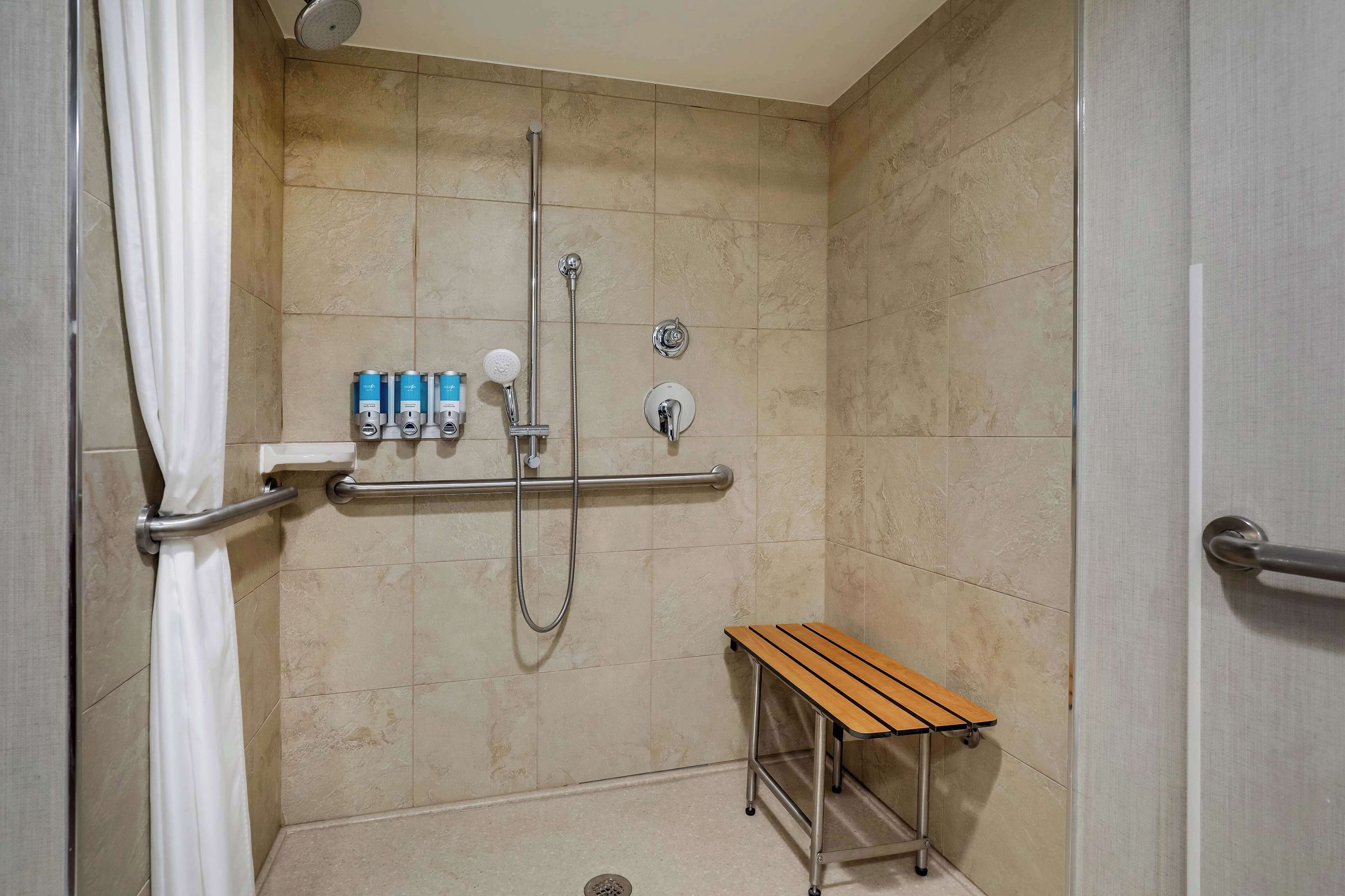 combined shower/bathtub, eco-friendly toiletries, hair dryer, towels