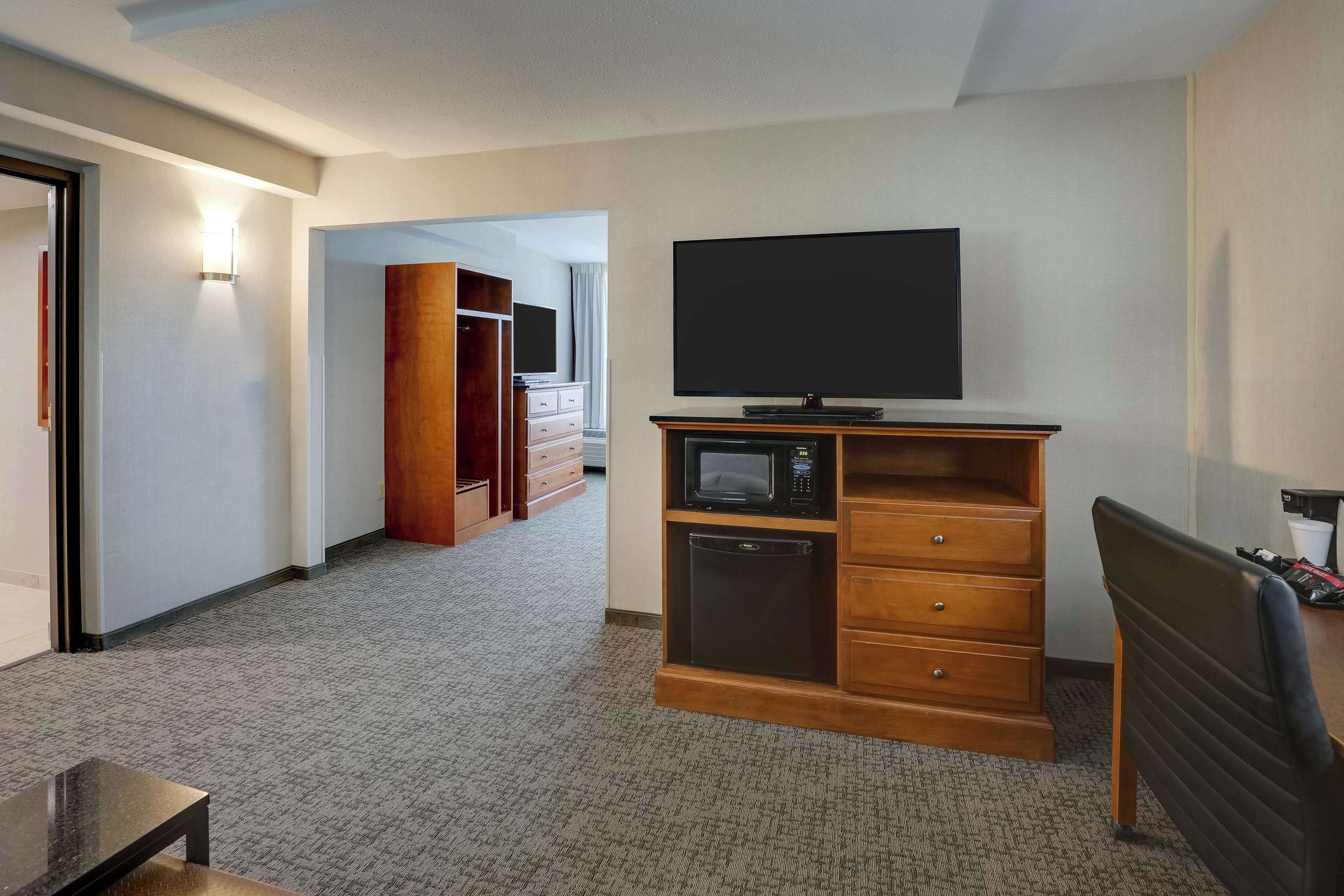 deluxe room, 1 king bed with sofa bed, refrigerator & microwave | 1 bedroom, desk, blackout curtains, iron/ironing board