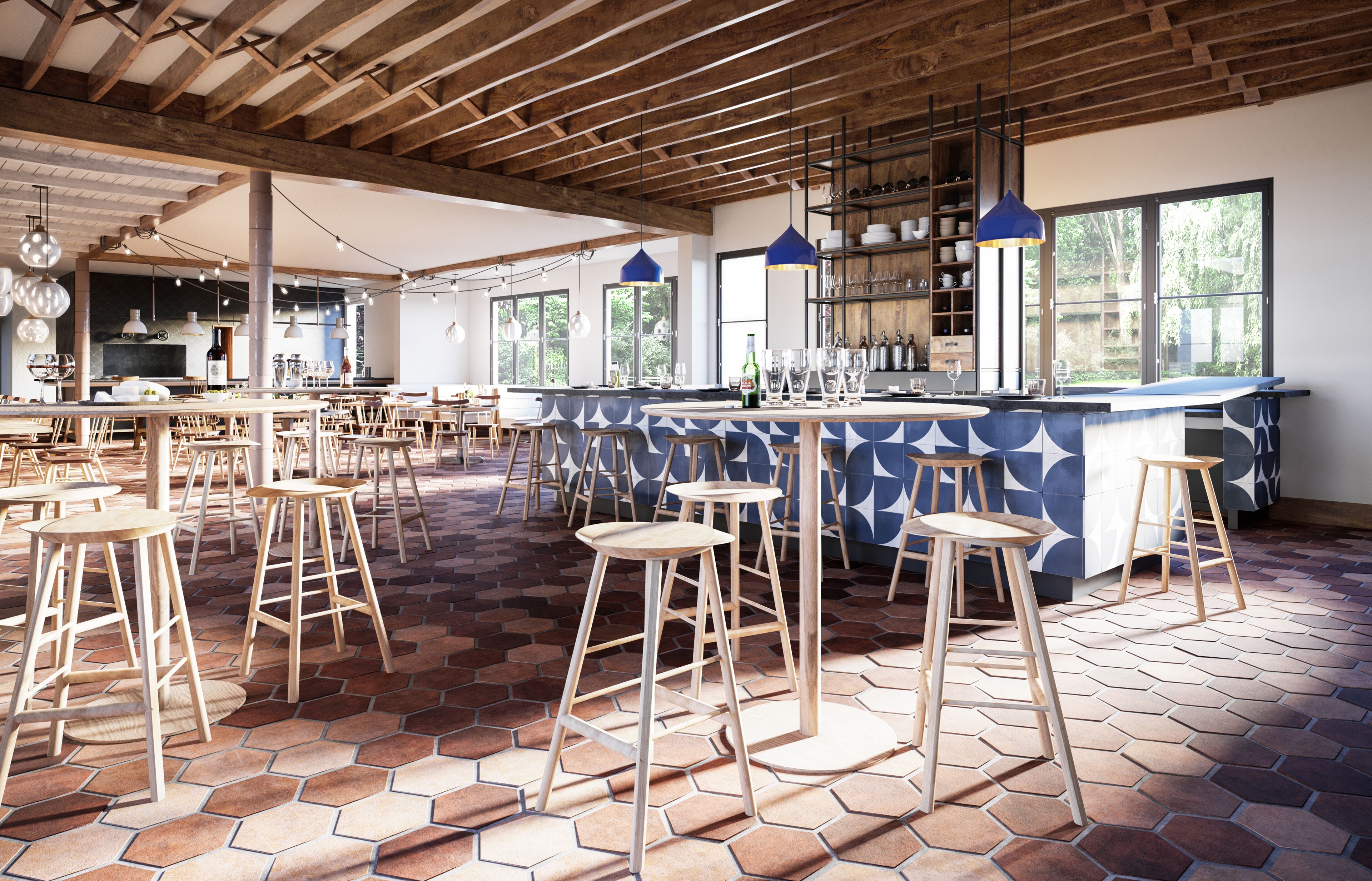 A spacious bar area with hexagonal patterned flooring, wooden stools, and a bar counter with stools.