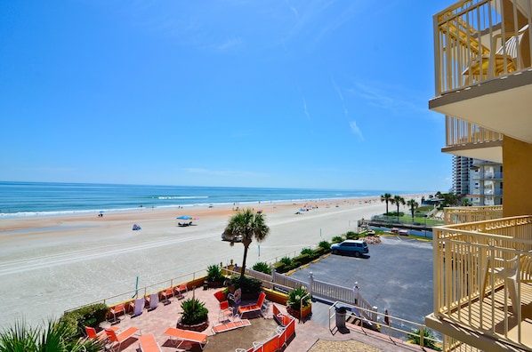 On the beach, white sand, beach towels