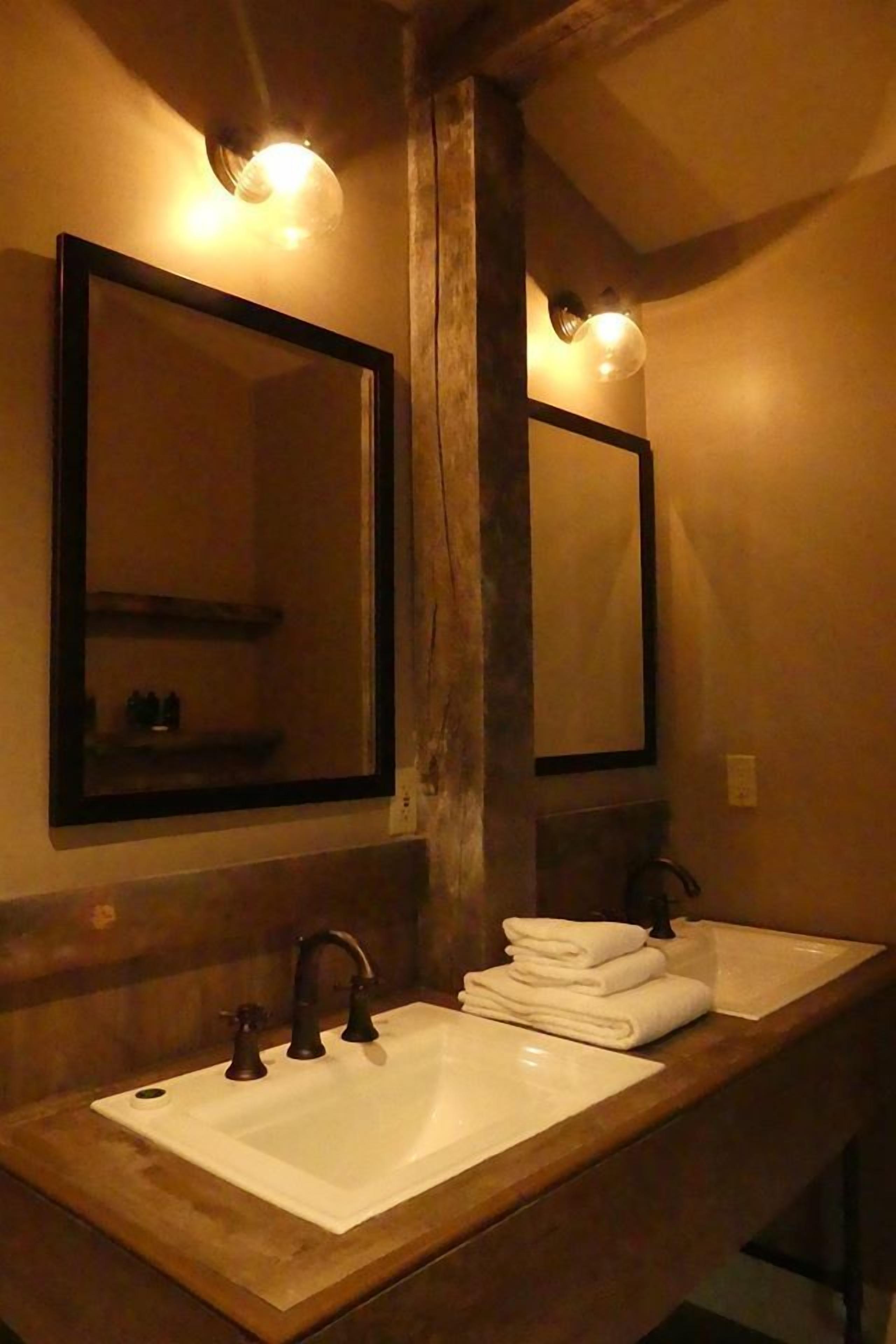 deluxe room, 1 king bed | bathroom sink