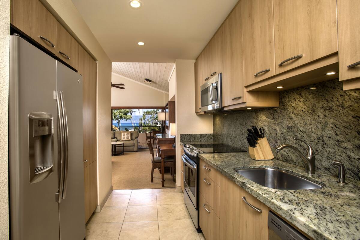 family studio, ocean view | private kitchen | fridge, coffee/tea maker, high chair