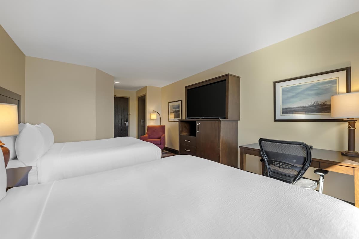 Premium bedding, down comforters, pillowtop beds, in-room safe