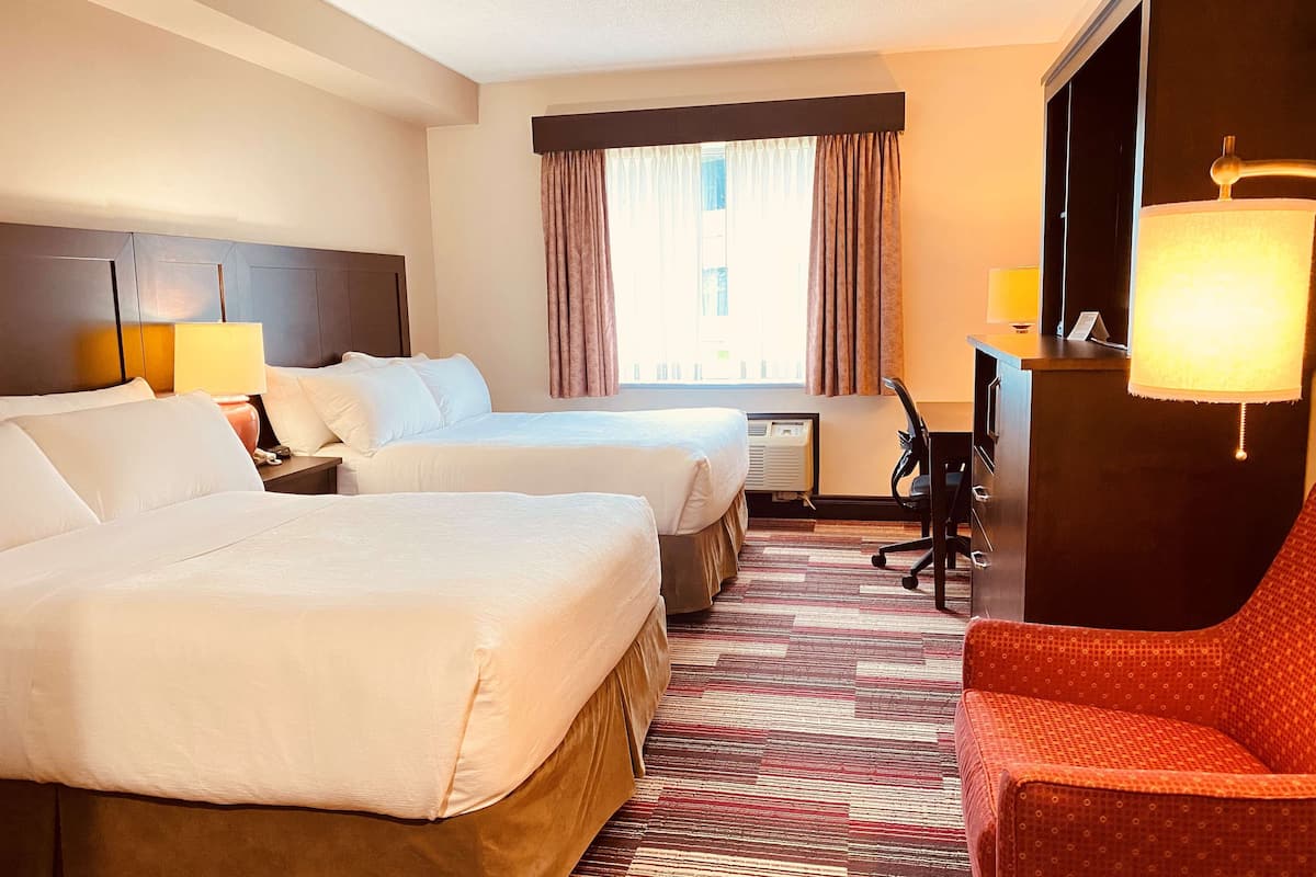 standard room, 2 queen beds, refrigerator & microwave, ground floor | premium bedding, down duvets, pillow-top beds, in-room safe