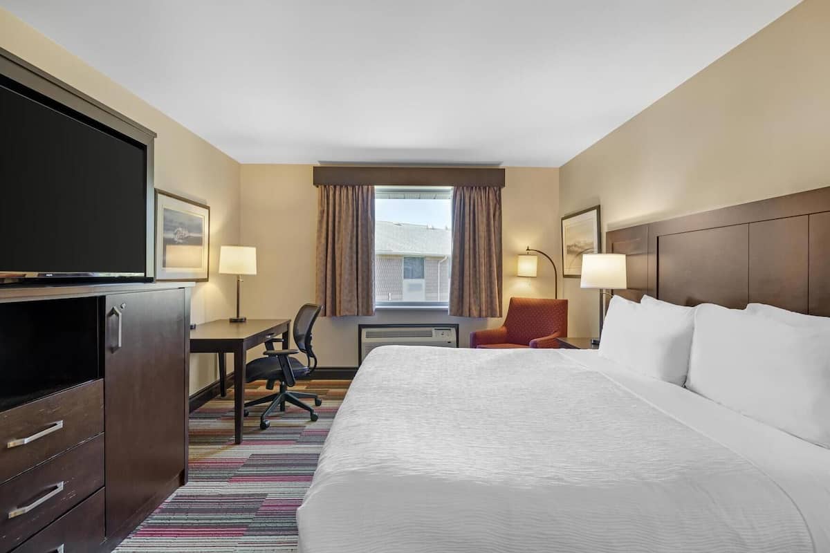 Premium bedding, down comforters, pillowtop beds, in-room safe