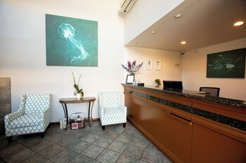 Hotel entrance and lobby at Munras Inn