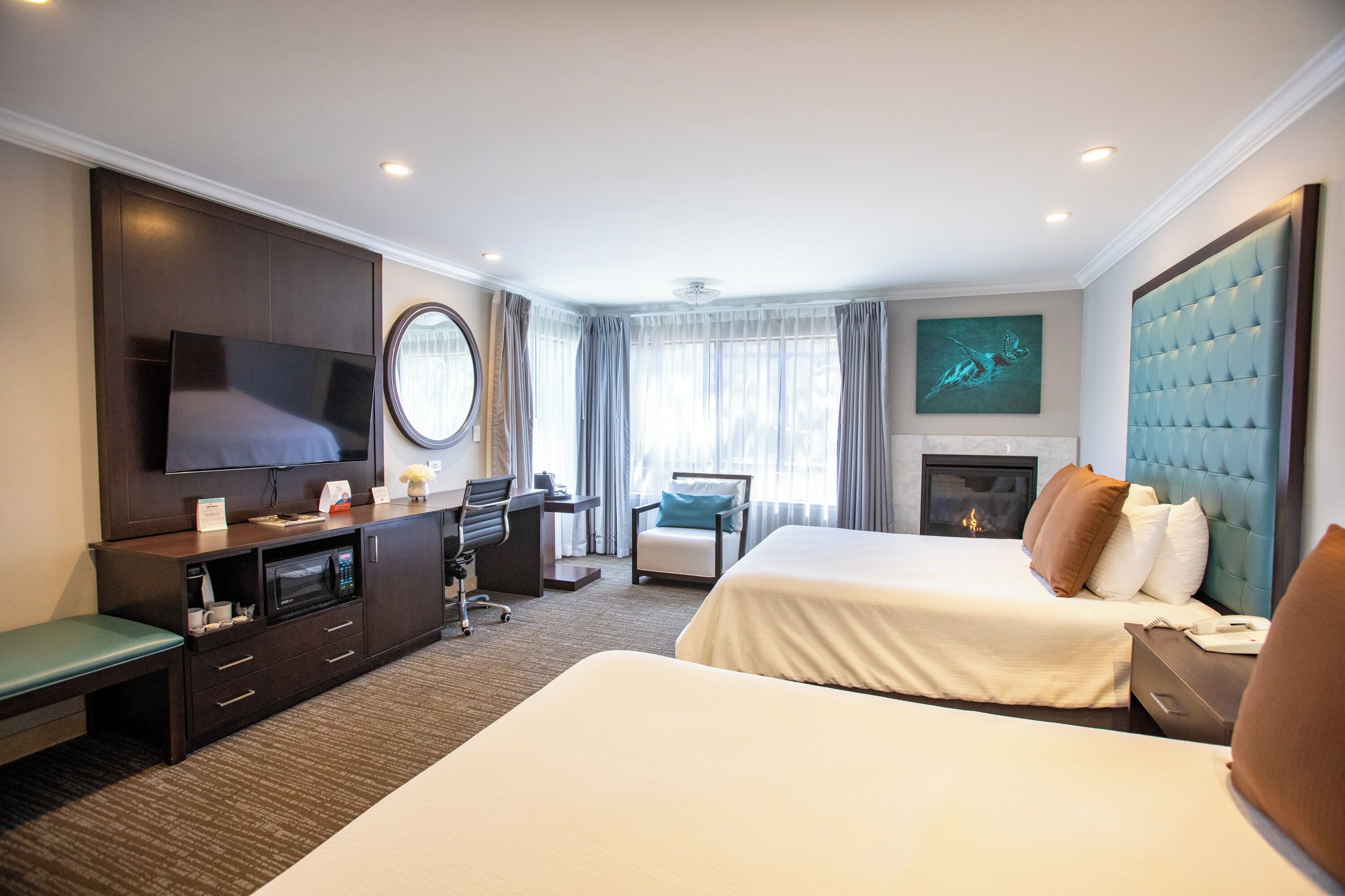 room, 2 queen beds, non smoking, fireplace | desk, iron/ironing board, cots/infant beds, free wifi