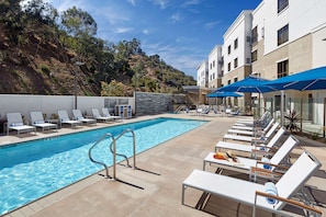 Outdoor pool, pool umbrellas, sun loungers