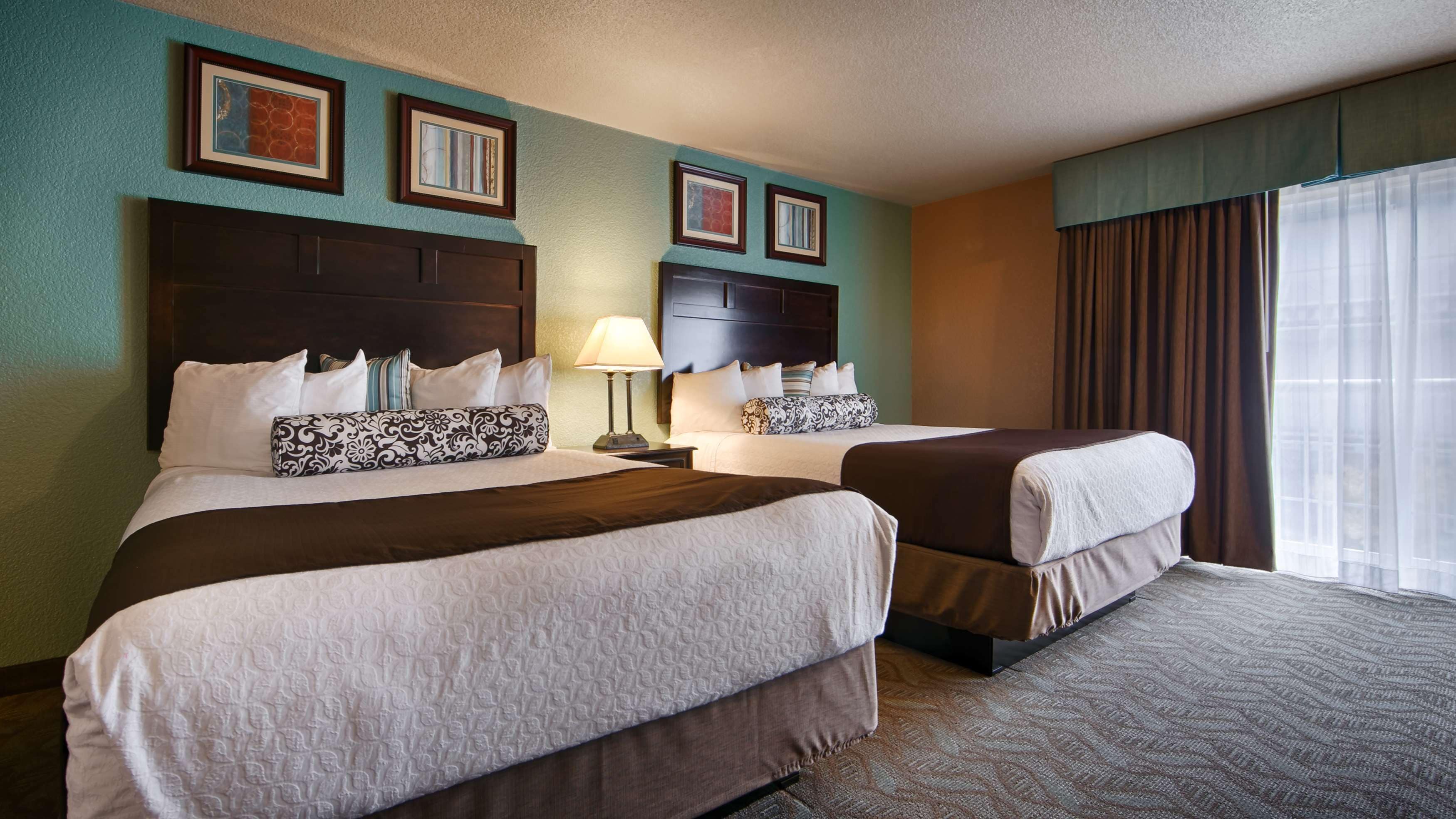 standard room, 2 queen beds, non smoking, refrigerator & microwave | desk, blackout curtains, soundproofing, iron/ironing board