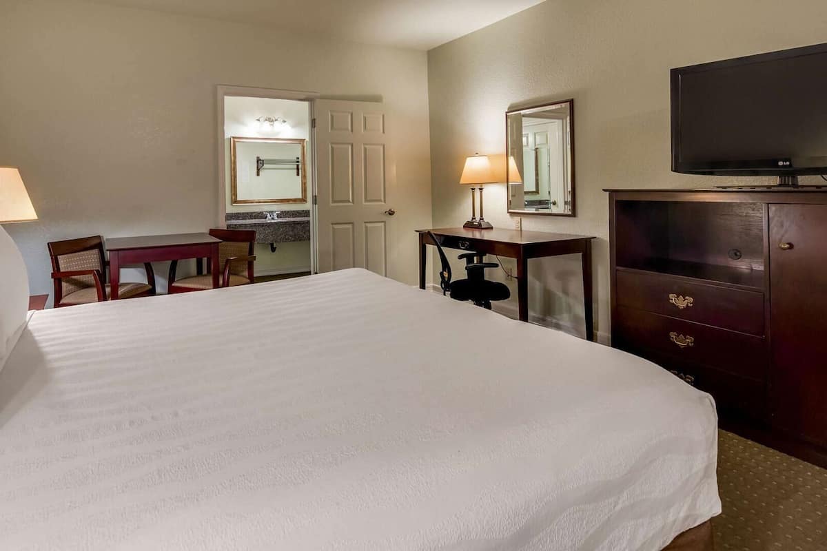 Desk, blackout curtains, soundproofing, iron/ironing board