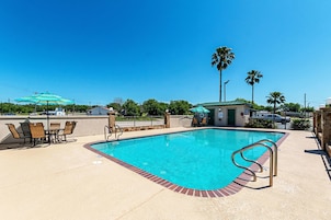 Outdoor pool, open 10:00 AM to 11 PM, pool umbrellas, sun loungers