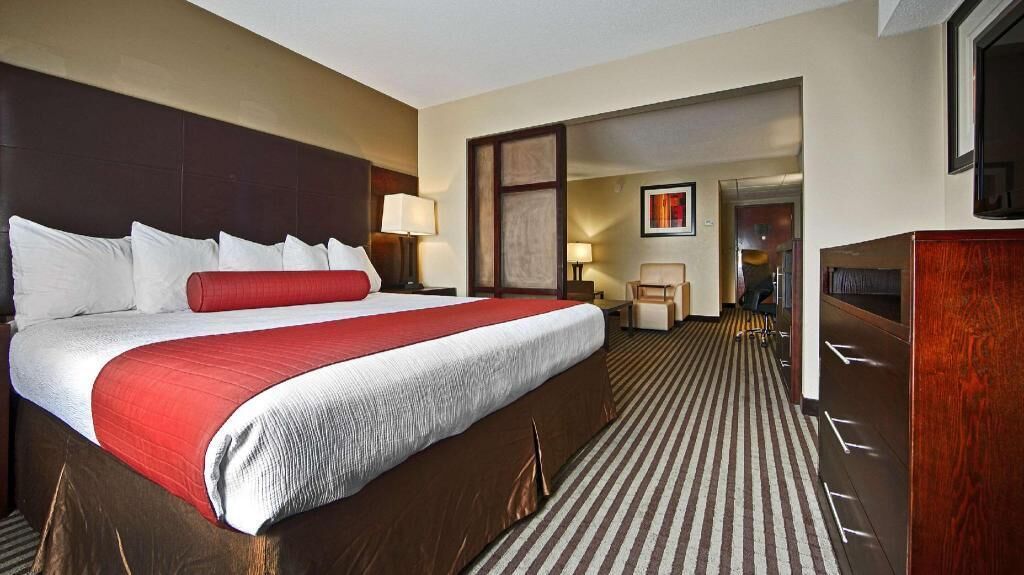 Desk, blackout drapes, iron/ironing board, rollaway beds