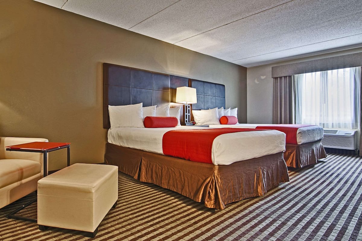 Desk, blackout drapes, iron/ironing board, rollaway beds