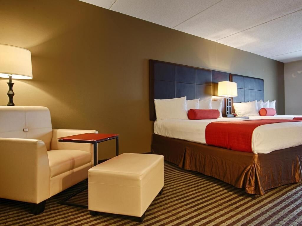 Desk, blackout drapes, iron/ironing board, rollaway beds