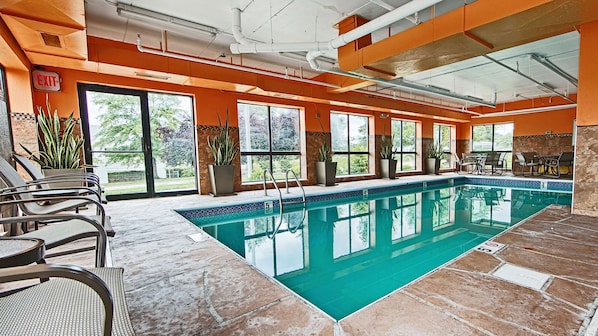 Indoor pool, open 10:00 AM to 10:00 PM, pool loungers