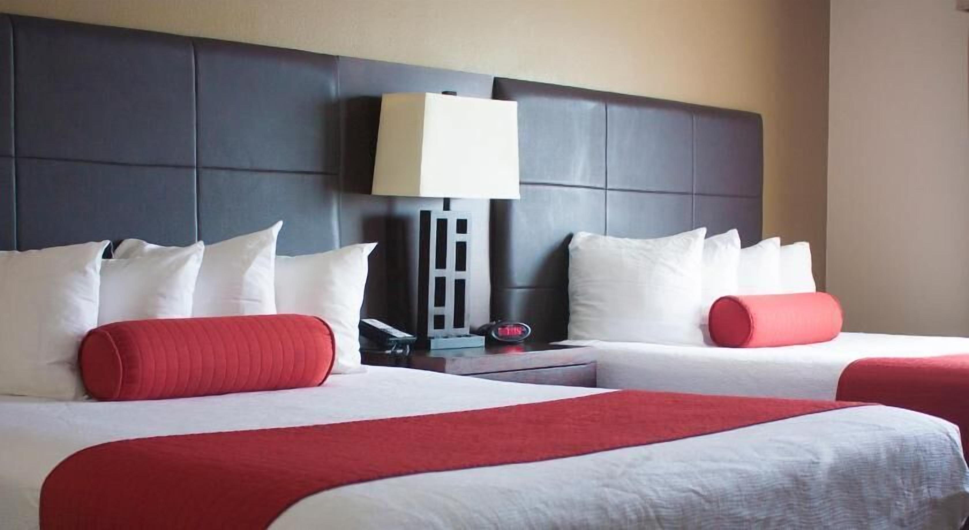 Desk, blackout drapes, iron/ironing board, rollaway beds