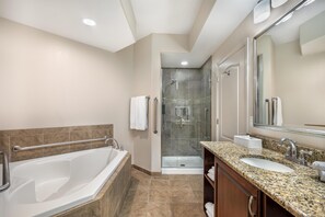 1 BEDROOM 1 KING SUITE WITH SOFABED | Bathroom shower