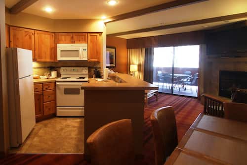 Standard Room, 1 Bedroom | Living area | 42-inch LED TV with cable channels, TV, DVD player