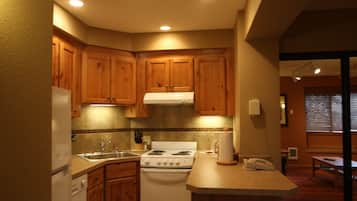 Deluxe Studio | Private kitchenette | Full-size fridge, microwave, stovetop, dishwasher