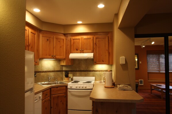 Deluxe Studio | Private kitchenette | Full-sized fridge, microwave, stovetop, dishwasher