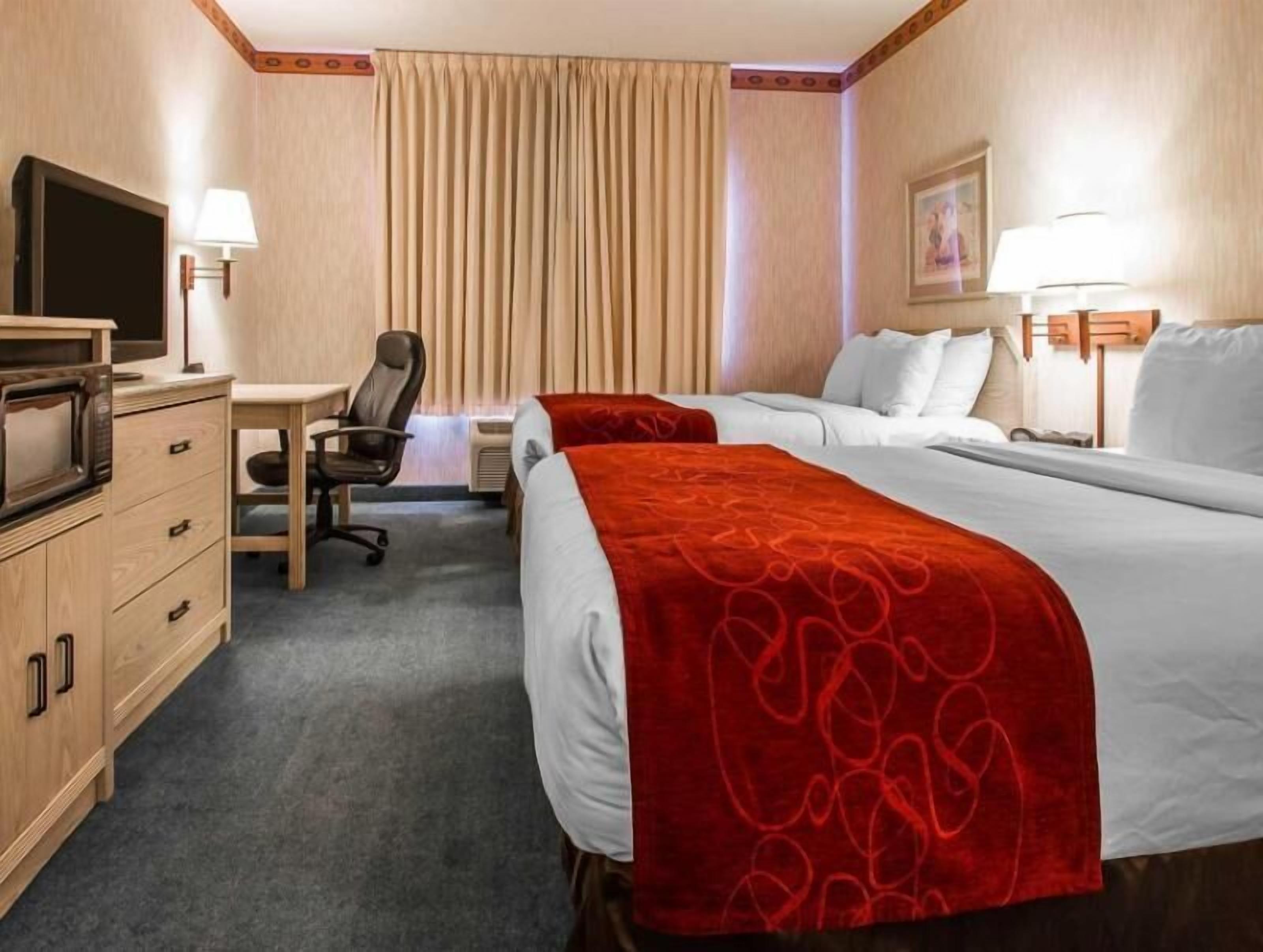 Premium bedding, pillow-top beds, in-room safe, desk