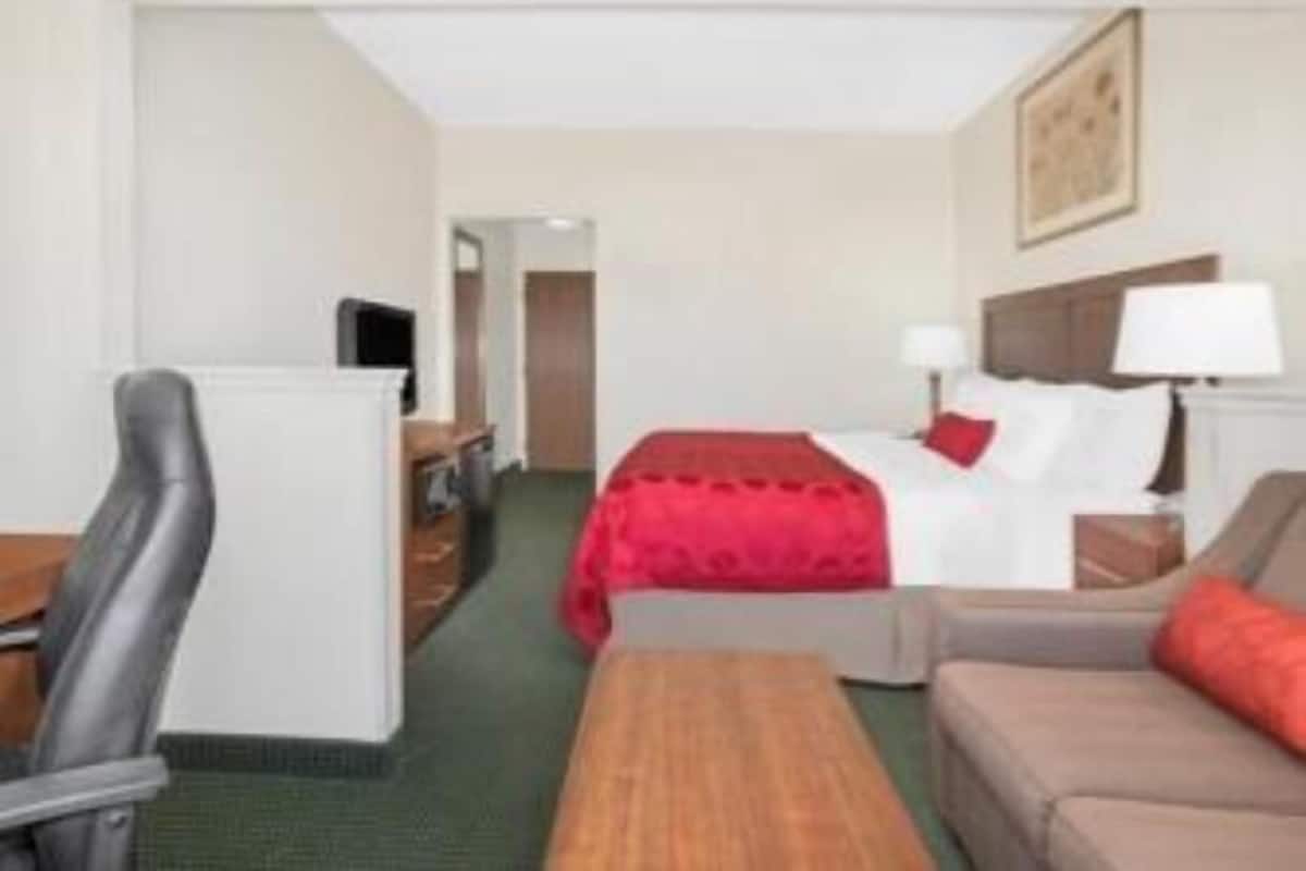 Premium bedding, desk, blackout curtains, iron/ironing board