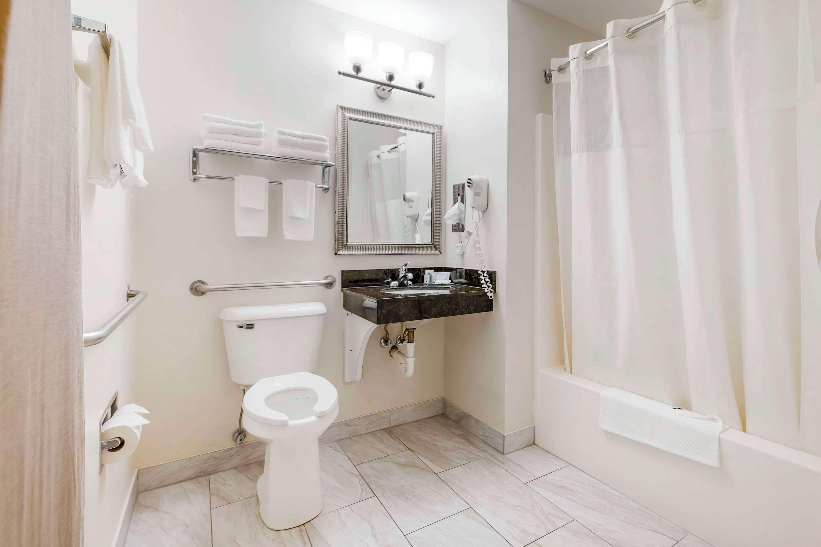 suite, 1 king bed, accessible, non smoking | iron/ironing board, free wifi, bed sheets, alarm clocks