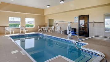 Indoor pool, open 10:00 AM to 10:00 PM, pool loungers