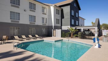 Outdoor pool, open 10:00 AM to 10:00 PM, pool umbrellas, sun loungers