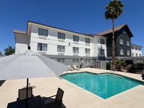 Outdoor pool, open 10:00 AM to 10:00 PM, pool umbrellas, sun loungers