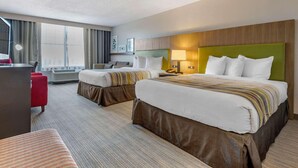 A hotel room with two beds, a desk, a chair, and a large window. - Country Inn & Suites by Radisson, Lumberton, NC (Lumberton)