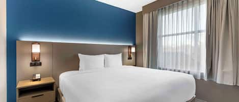 Suite, 1 habitación, para no fumadores | 1 habitación, ropa de cama de alta calidad y escritorio