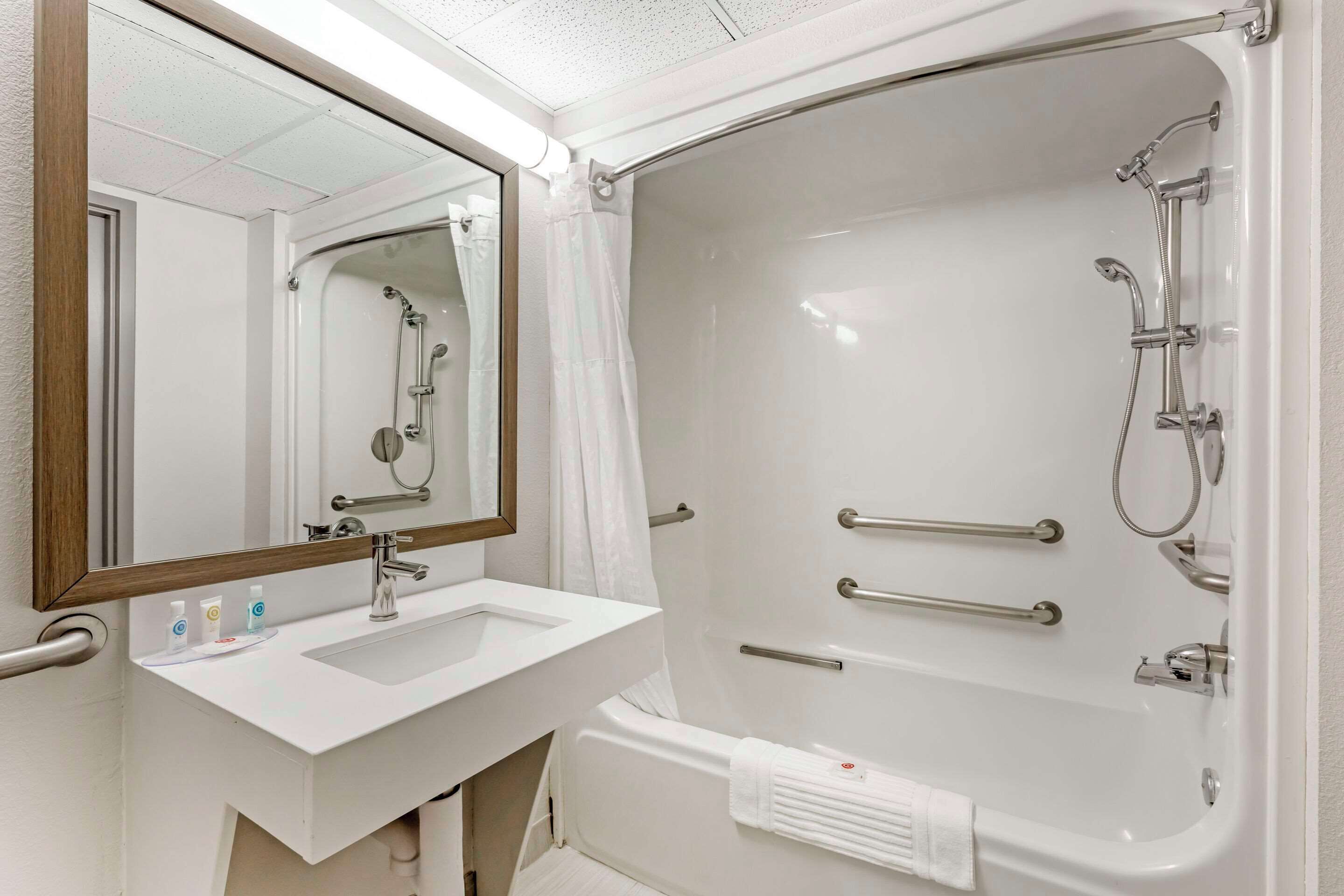 premium bedding, desk, blackout curtains, iron/ironing board