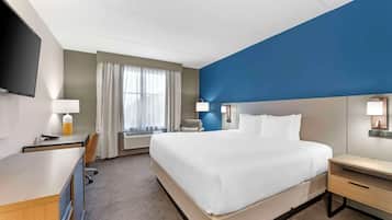 Premium bedding, desk, blackout drapes, iron/ironing board