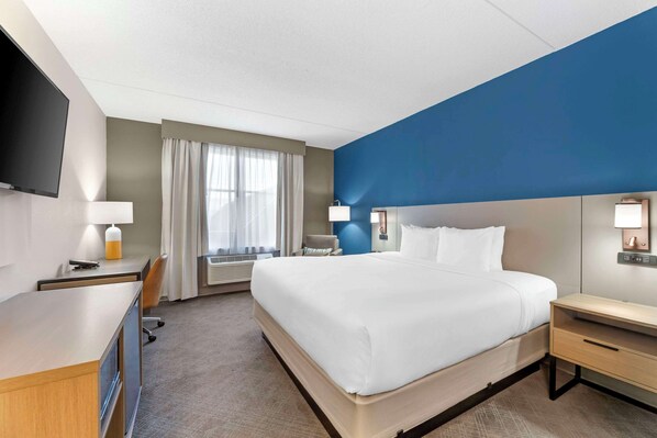 Premium bedding, desk, blackout curtains, iron/ironing board