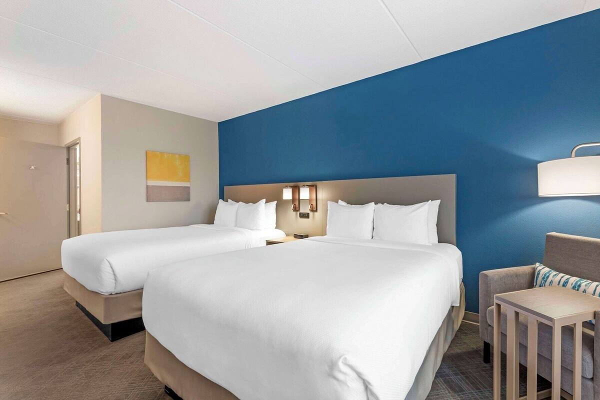 Premium bedding, desk, blackout drapes, iron/ironing board