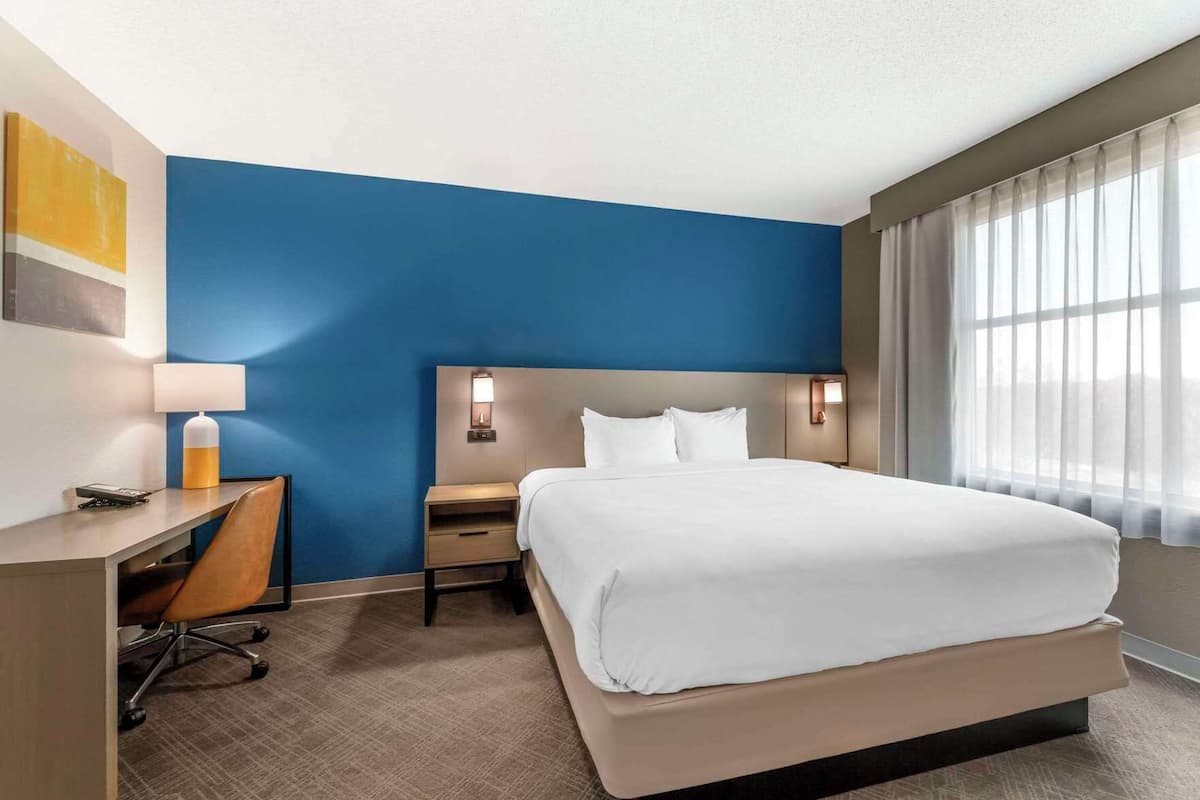 Premium bedding, desk, blackout drapes, iron/ironing board
