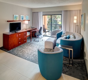 Suite, 1 Bedroom | Living area | 32-inch LCD TV with cable channels, TV, pay films