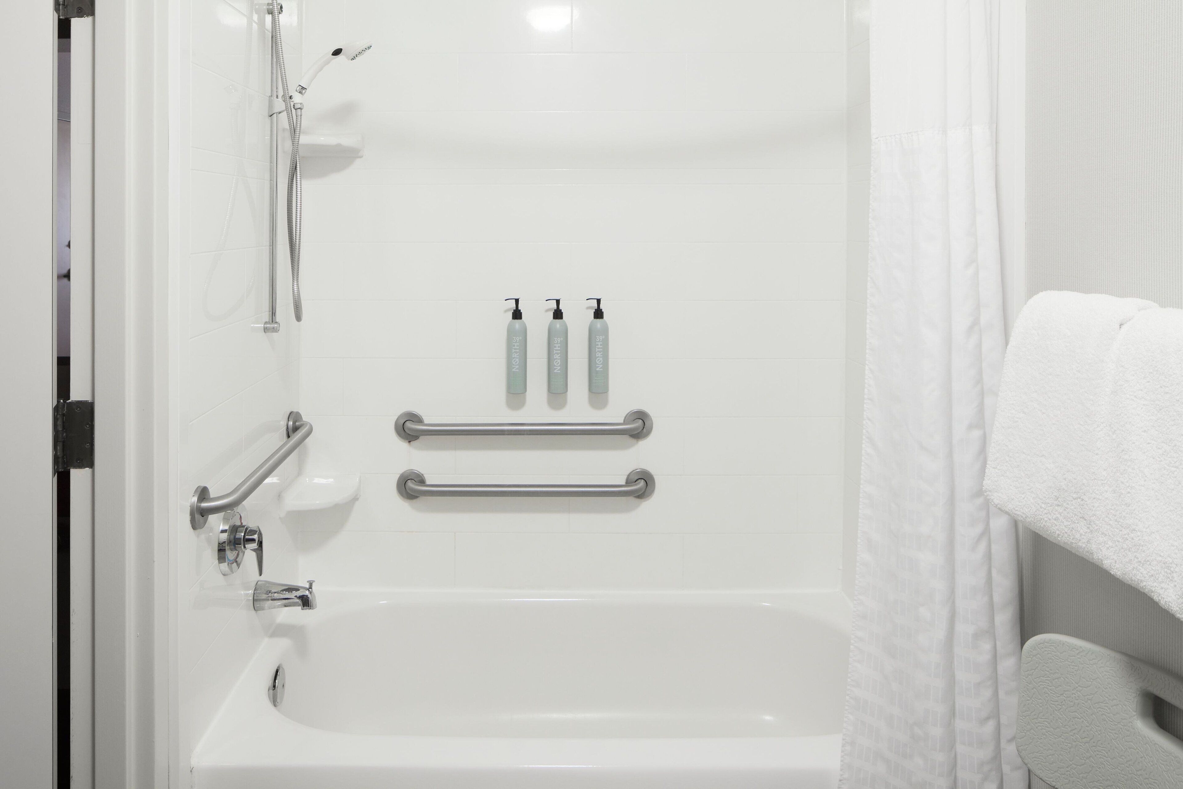 combined shower/bathtub, free toiletries, hair dryer, towels